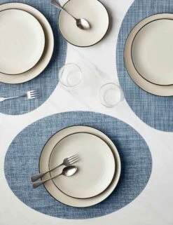 Mini Basketweave Oval Placemat (Set Of 4) By Chilewich -Home Furnishings Store ChilewichMiniBasketweaveOvalPlacemat Chambray Setof4 6259 74a0a8ba 87d4 4992 b2bb 63bc9f939386