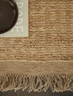 Bryn Jute Rug, Natural -Home Furnishings Store bryn jute rug natural black 128 texture site crop 3 1 ab1e159d 1a55 4fc3 9a80 f86f705a8381